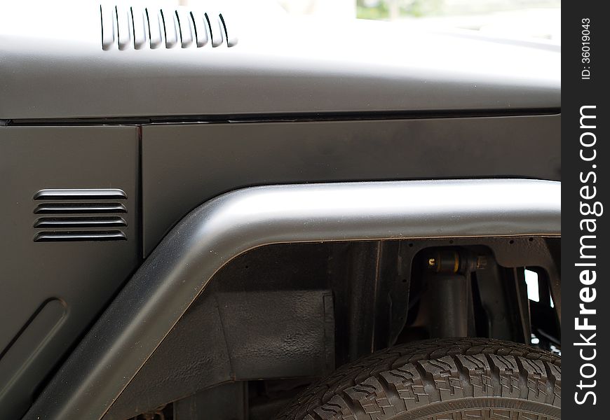 A grey 4x4 off-road car - Detail. A grey 4x4 off-road car - Detail