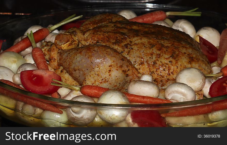 Appetizing roast chicken and potatoes in the oven,time lapse