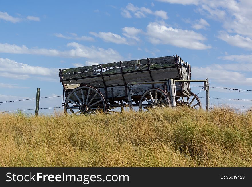 Horse drawn wagon on a hill