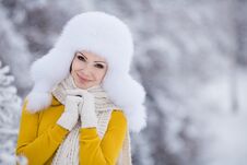 Winter Portrait Of Beautiful Smiling Woman With Snowflakes In White Furs Royalty Free Stock Images