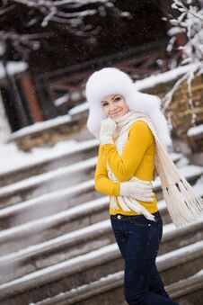 Winter Portrait Of Beautiful Smiling Woman With Snowflakes In White Furs Stock Photo Winter Portrait Of Beautiful Smiling Woman With Snowflakes In White Furs Stock Photo