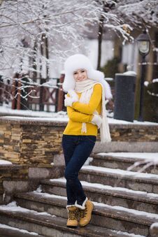 Winter Portrait Of Beautiful Smiling Woman With Snowflakes In White Furs Royalty Free Stock Photos