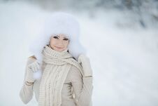 Winter Portrait Of Beautiful Smiling Woman With Snowflakes In White Furs Royalty Free Stock Photo