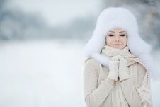 Winter Portrait Of Beautiful Smiling Woman With Snowflakes In White Furs Stock Images