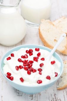 Homemade Yogurt With Pomegranate, Milk And Bread For Breakfast Royalty Free Stock Image