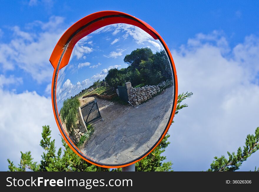 A mirror view of an entrance to a farmhouse in the maltese countryside. A mirror view of an entrance to a farmhouse in the maltese countryside