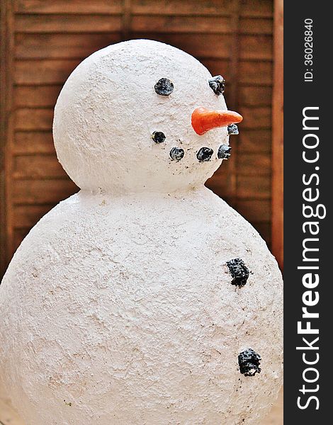 Christmas snowman model with carrot and coal