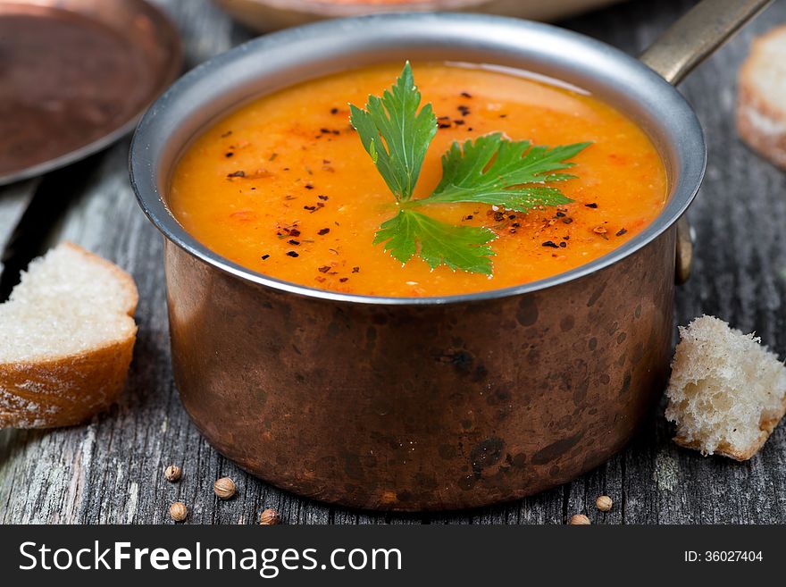 Spicy Red Lentil Soup In A Copper Saucepan, Close-up