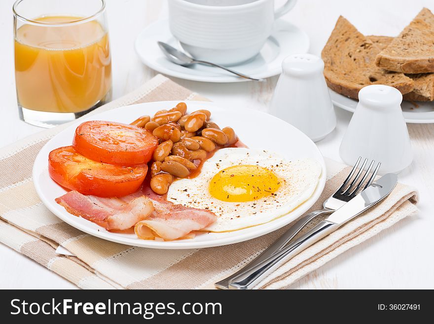 Traditional English breakfast, coffee and juice, horizontal