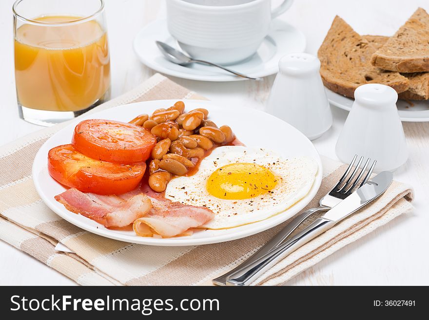 Traditional English breakfast, coffee and juice