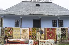 Traditional House With Carpets Exposed In Front. Royalty Free Stock Images Traditional House With Carpets Exposed In Front. Royalty Free Stock Images