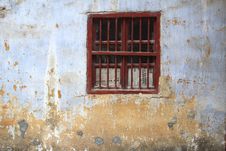 Window With Bars And Newspapers In An Old Grungy Wall, Daxu, China Royalty Free Stock Photo Window With Bars And Newspapers In An Old Grungy Wall, Daxu, China Royalty Free Stock Photo