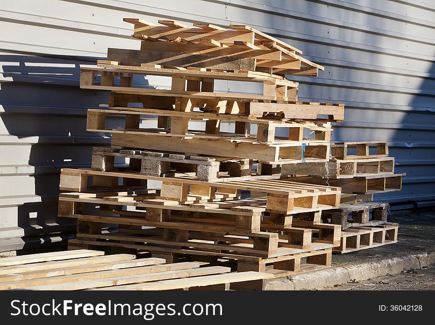 Heap of pallets resting in the sun