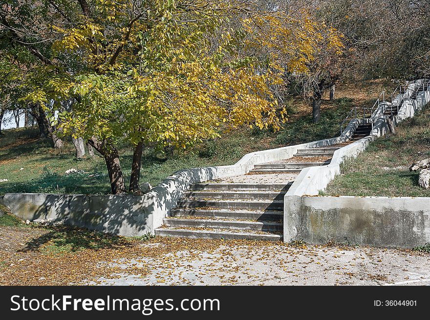 Autumn Landscape, Stairs in a park area, yellowing leaves, sunny weather. Autumn Landscape, Stairs in a park area, yellowing leaves, sunny weather