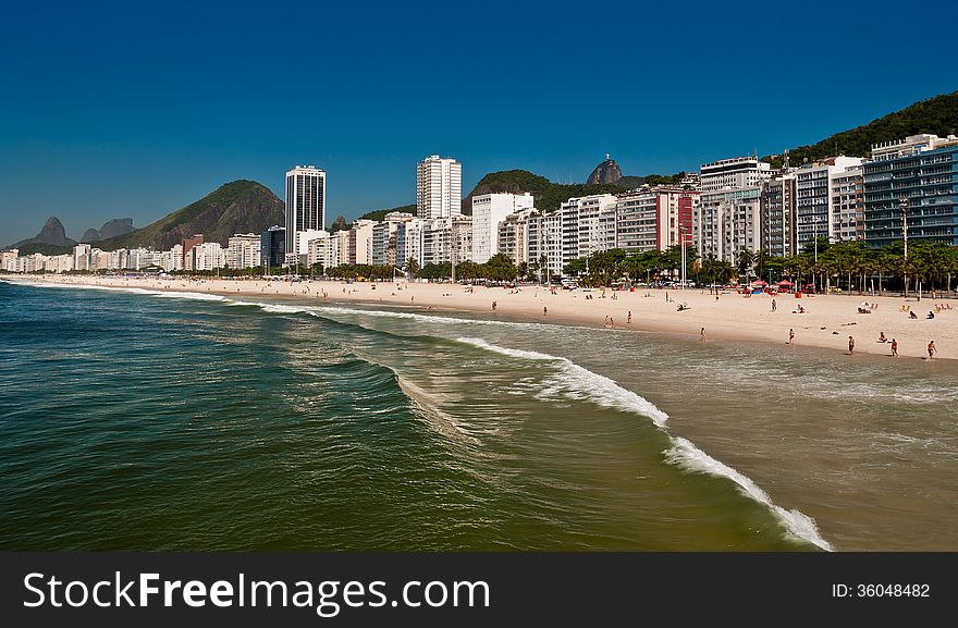 Panoramic view of Copacabana beach on a Sunny Summer Day in Rio de Janeiro, Brazil. Panoramic view of Copacabana beach on a Sunny Summer Day in Rio de Janeiro, Brazil.