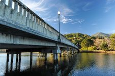 Concrete Bridge With Light Pole Over River Stock Photos Concrete Bridge With Light Pole Over River Stock Photos