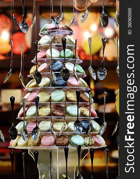 Macaroons Christmas Tree with multicoloured Macaroons and teaspoons. Macaroons Christmas Tree with multicoloured Macaroons and teaspoons