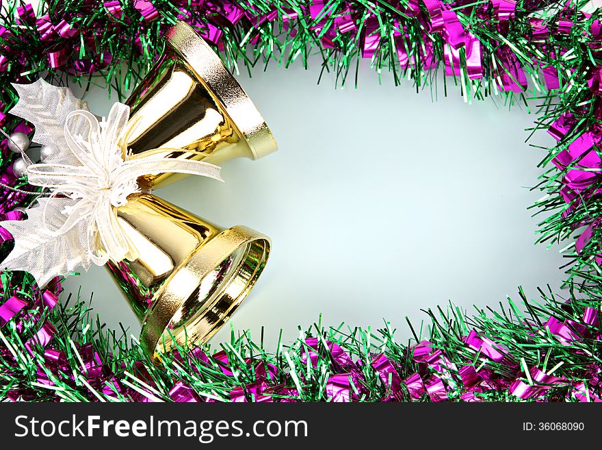 Crispy golden bells and decorations ribbon can use it in Christmas and New Year. Crispy golden bells and decorations ribbon can use it in Christmas and New Year.