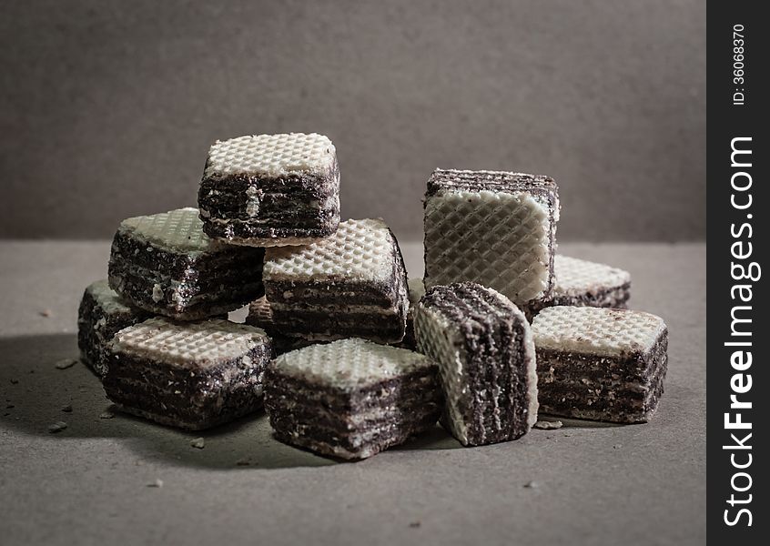 Stack of wafer in plate on dark background. Stack of wafer in plate on dark background.