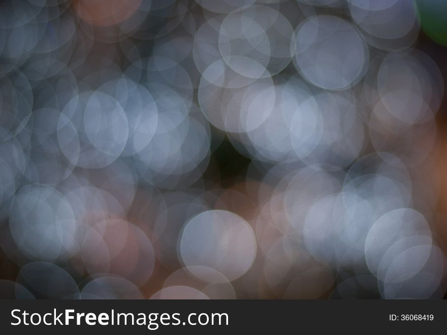 Blue abstract light bokeh background.