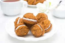 Pumpkin Cookies With Cream Filling And Tea Royalty Free Stock Images Pumpkin Cookies With Cream Filling And Tea Royalty Free Stock Images