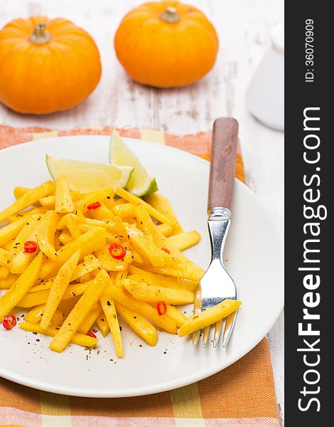 Salad Of Roasted Pumpkin With Lime And Chilli On The Plate