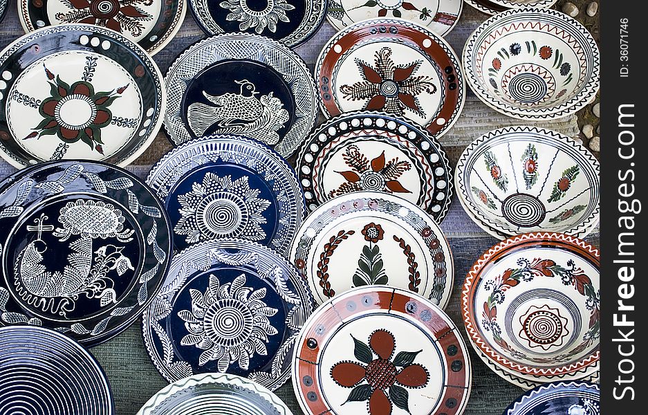 Various ceramic plates decorated with traditional motifs. Various ceramic plates decorated with traditional motifs