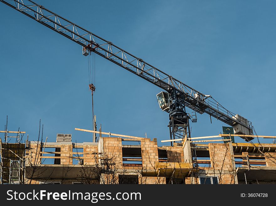 Construction crane at the construction site