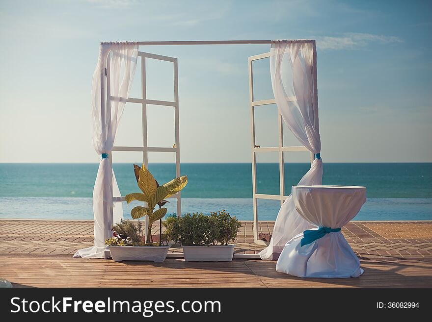 An image of a place setting at an elaborate wedding reception. An image of a place setting at an elaborate wedding reception