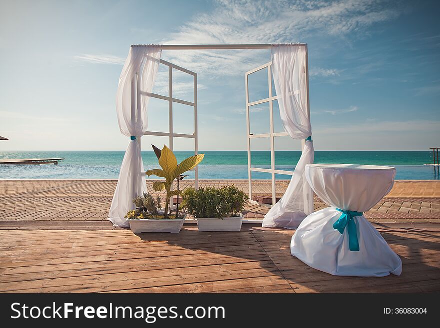 An image of a place setting at an elaborate wedding reception. An image of a place setting at an elaborate wedding reception