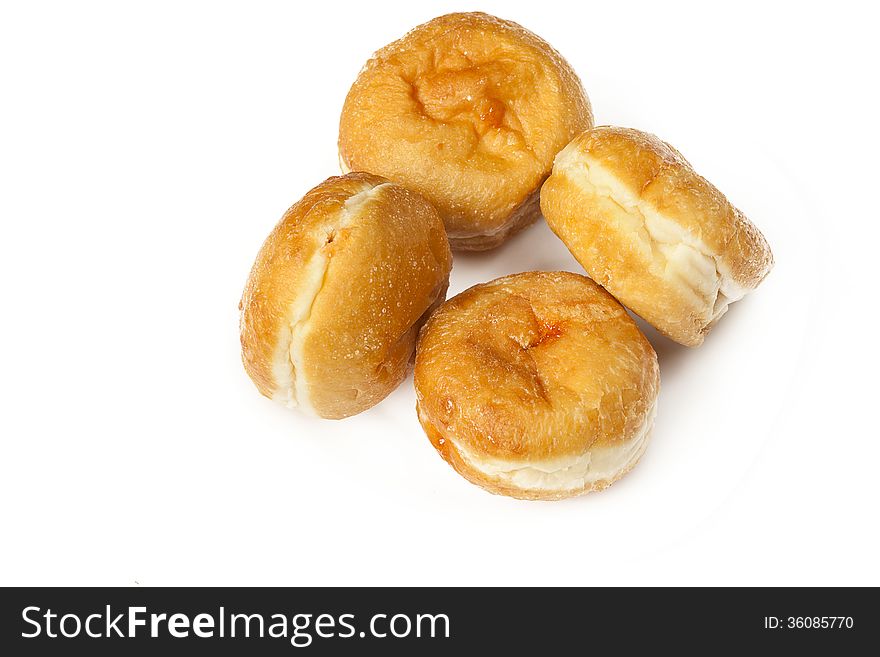 Four sugar donuts on white background. Four sugar donuts on white background
