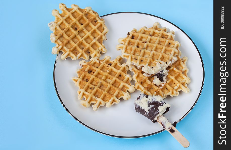Plate Of Waffles On Light Blue Background