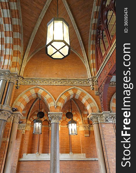 Image of ornate Victorian arch with period lighting taken in London, england