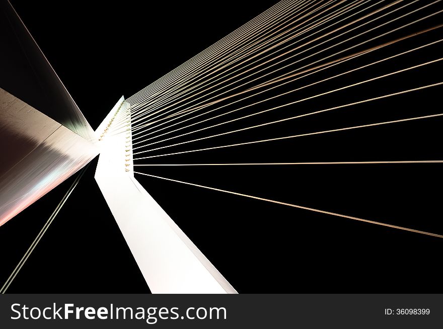 Abstract View of Big White Suspension Bridge Cables at Night