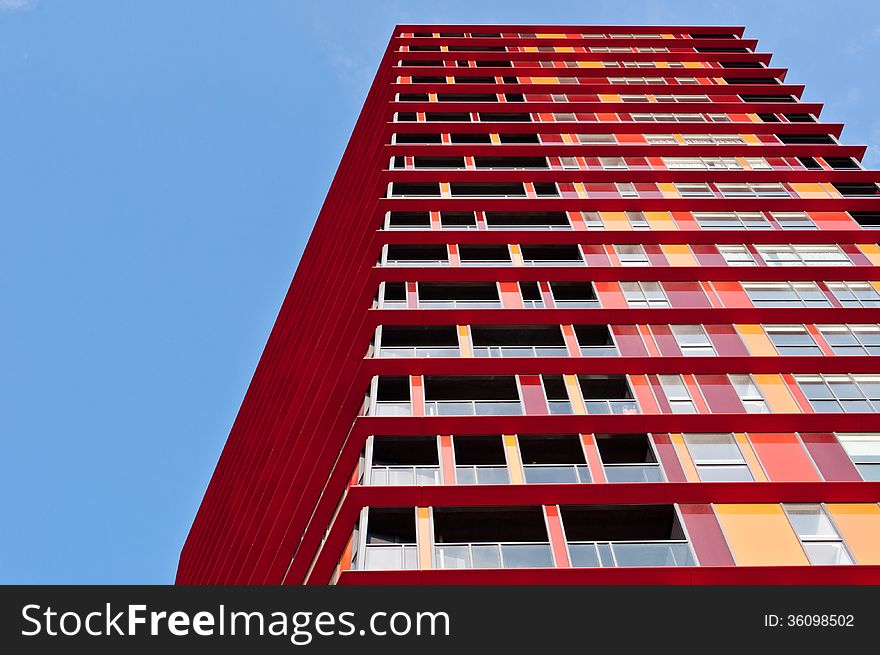 New modern architecture red apartment building. New modern architecture red apartment building.