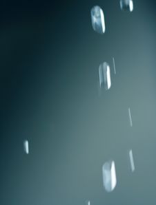 Falling Water Drops From Eaves Stock Photo Falling Water Drops From Eaves Stock Photo