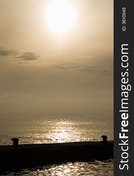 Sunset And Mooring Ship