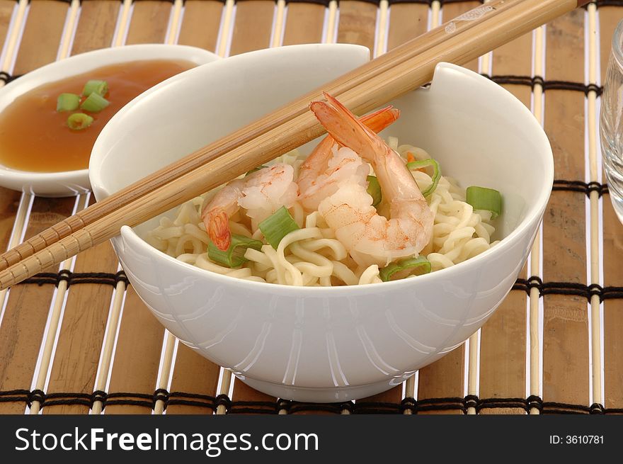 Bowl of delicious oriental noodles with shrimp. Bowl of delicious oriental noodles with shrimp.