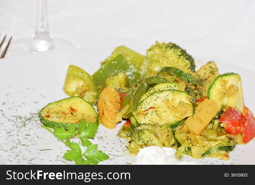 Colorful vegetarian food with kohlrabi, parsley, pepper, spices and zucchini. Colorful vegetarian food with kohlrabi, parsley, pepper, spices and zucchini.