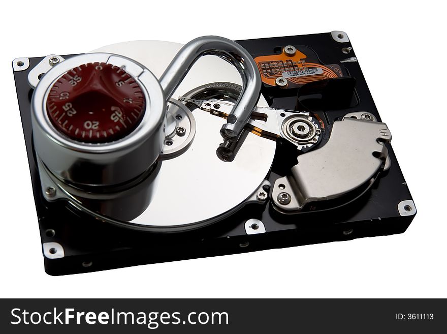 An exposed hard drive platter with an lock. An un-secured (insecure?) hard drive. Lack of computer security. An exposed hard drive platter with an lock. An un-secured (insecure?) hard drive. Lack of computer security.