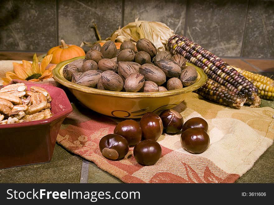 Colorful bowls of shelled and unshelled pecans. Colorful bowls of shelled and unshelled pecans