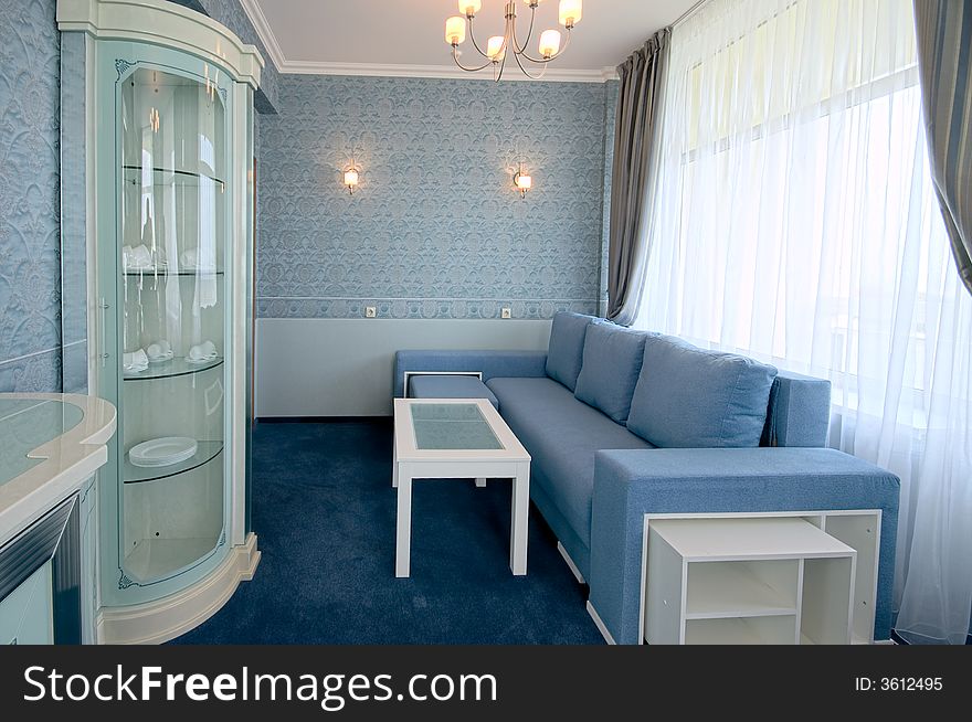 Room interior with blue and white furniture. Room interior with blue and white furniture