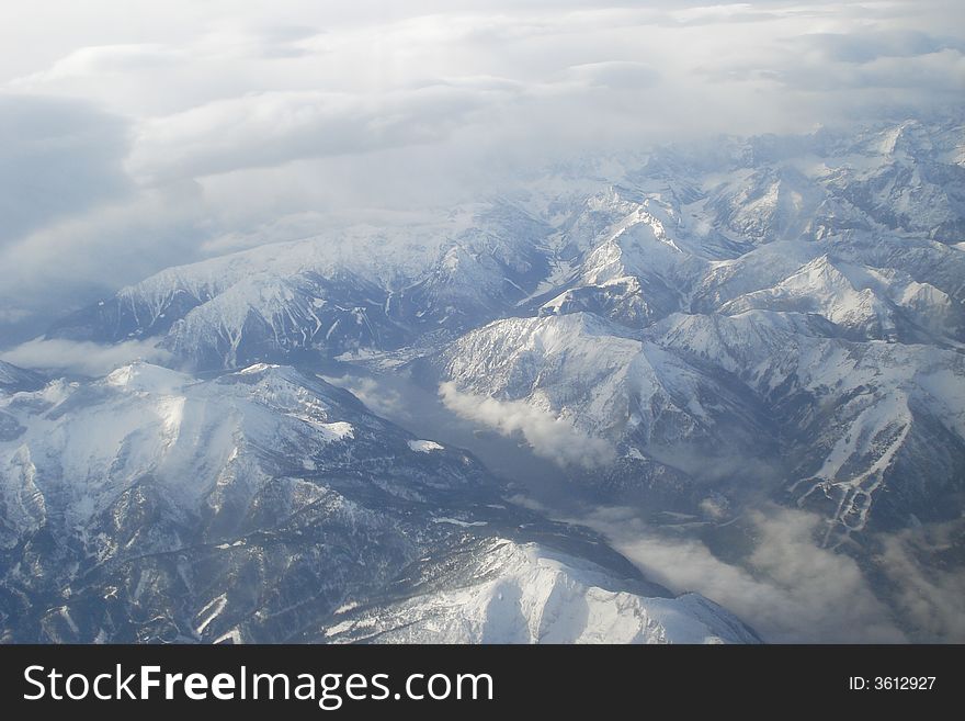Aerial view of the Alps in switzerland covered by snow. Aerial view of the Alps in switzerland covered by snow.
