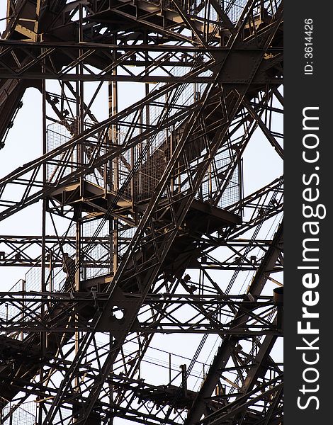 Detail view of the structure of the Eiffel Tower in Paris. Detail view of the structure of the Eiffel Tower in Paris.