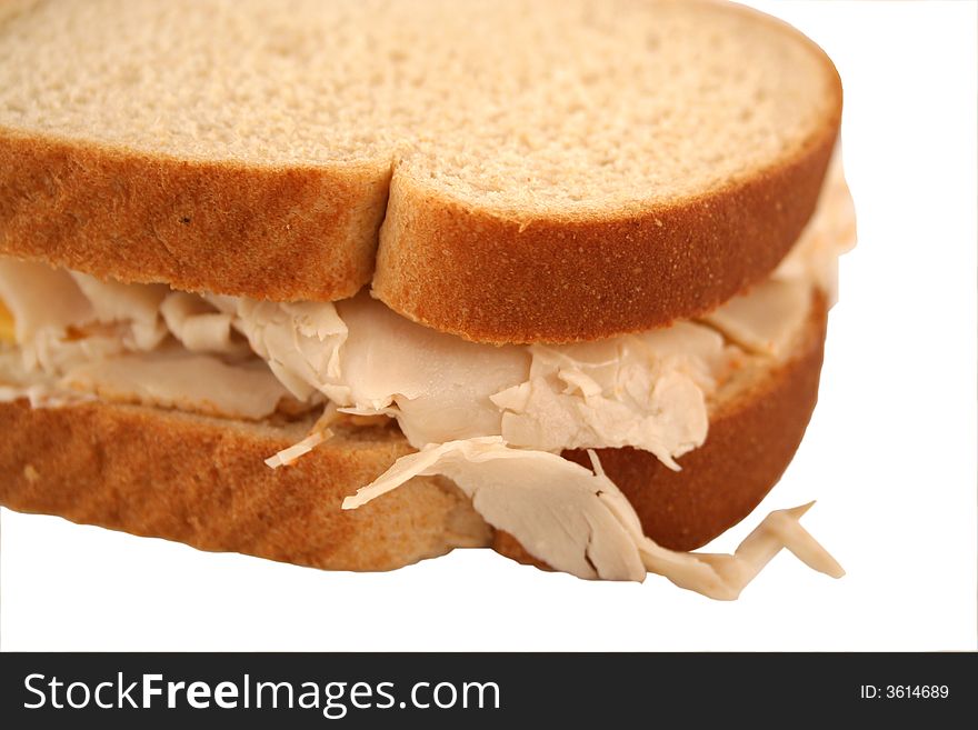 Isolated  Turkey Sandwich on Whole Grain Bread