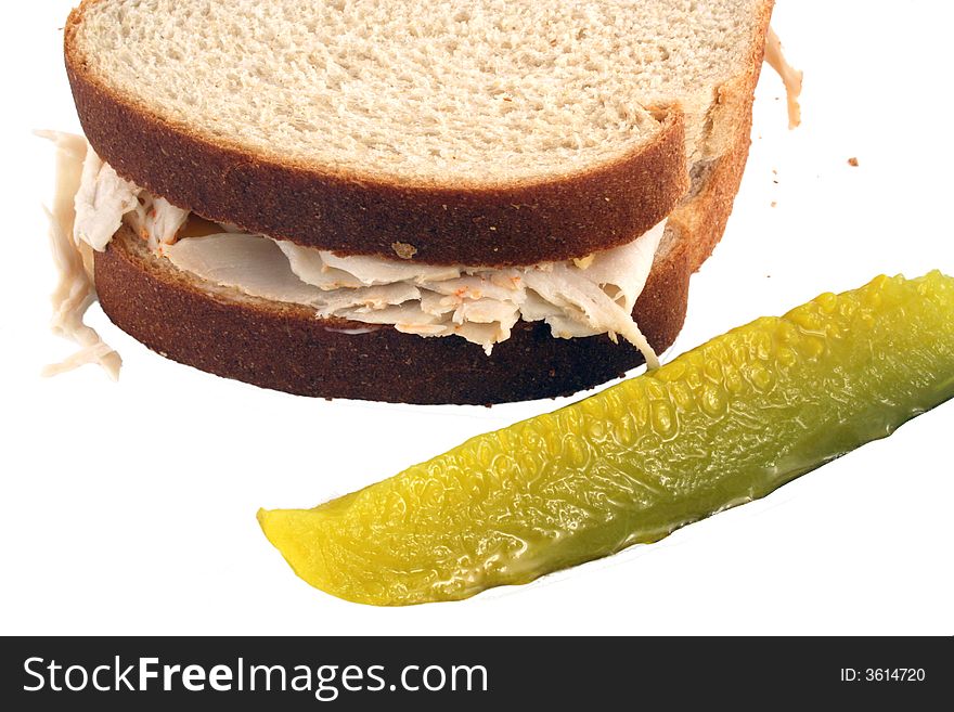 Isolated  Turkey Sandwich With Pickle