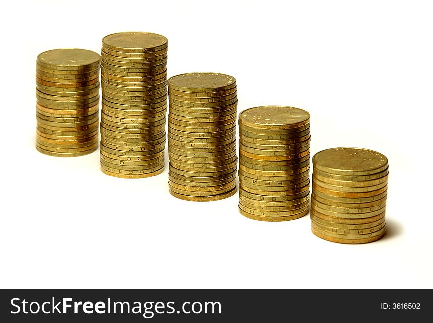 Columns of golden coins against a white background