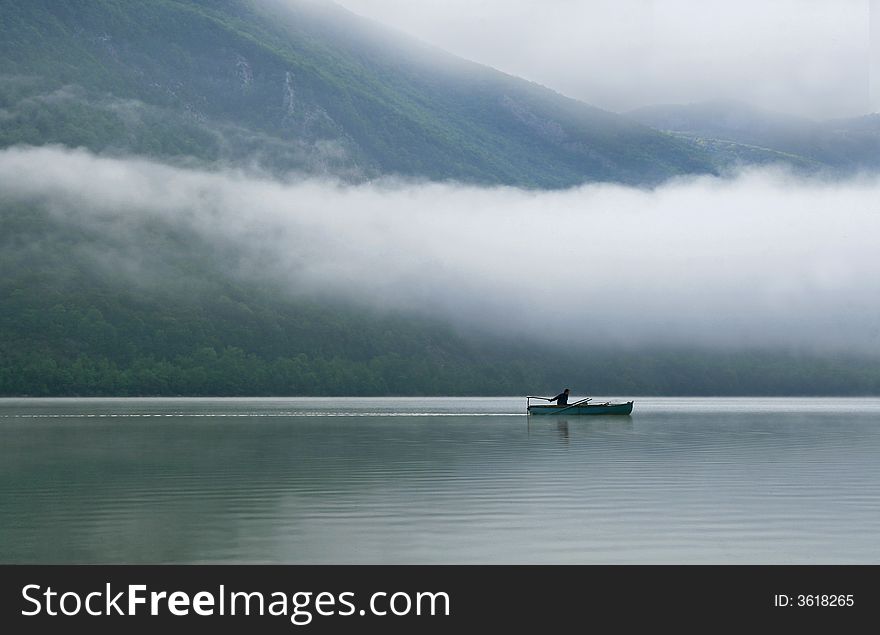 Boat in lake with cloud. Boat in lake with cloud