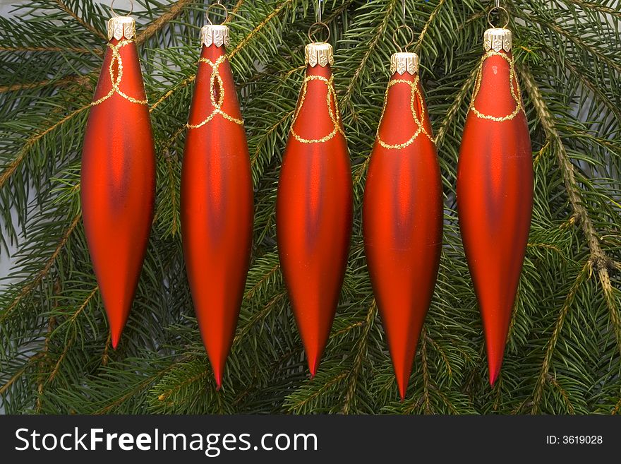 A row of christmas ornaments - seasonal decoration - close up. A row of christmas ornaments - seasonal decoration - close up