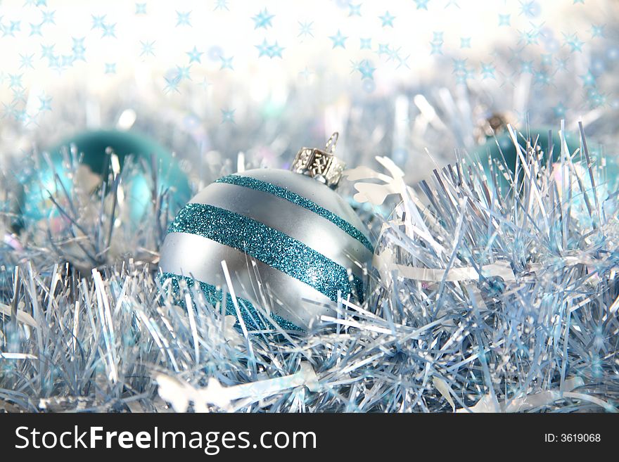 Blue Christmas: Cool blue and silver ornaments nestled among some coordinating garland with space for copy. Blue Christmas: Cool blue and silver ornaments nestled among some coordinating garland with space for copy.